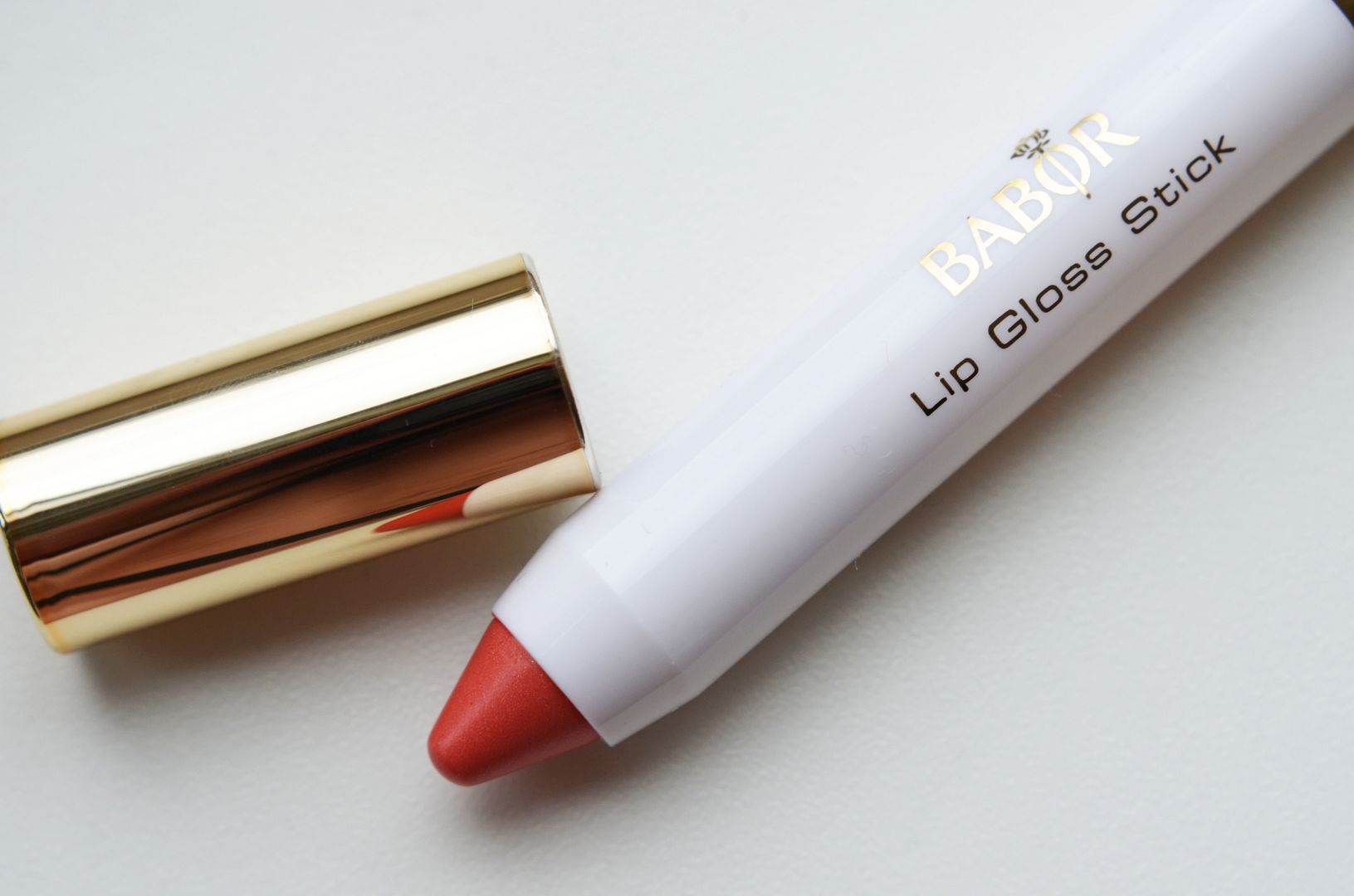 Babor Lip Gloss Stick 02 Sea Anemone en Babor Ultra Performance Nail Colour 34 Oh Là Là!